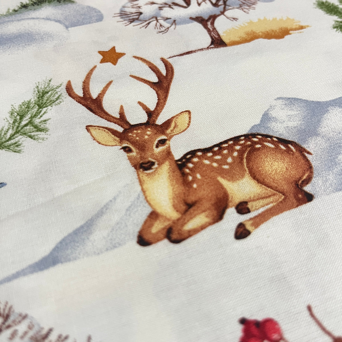Tissu de Noël forêt enneigée faons et bonshommes de neige, popeline de coton 240 cm, tissu au mètre plié - MyTissus